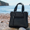 BOLSO DE MANO CON BANDOLERA, SERIE ROQUETAS. 22x20x12 CM - Matties Bags
