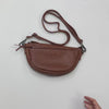 Bolso bandolera de piel natural compacto